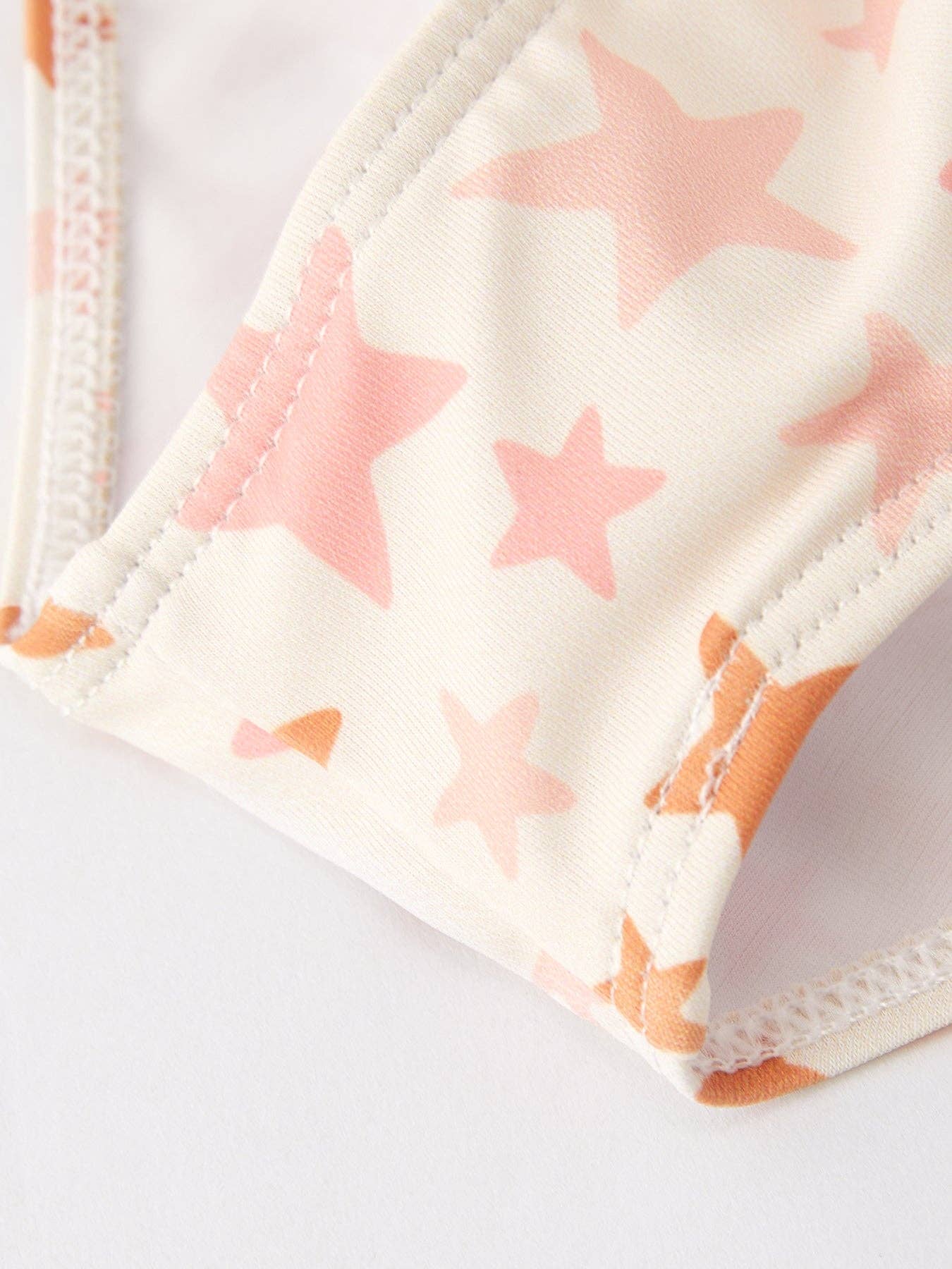 “Star” Floral Boutique Swimsuit: 8/9