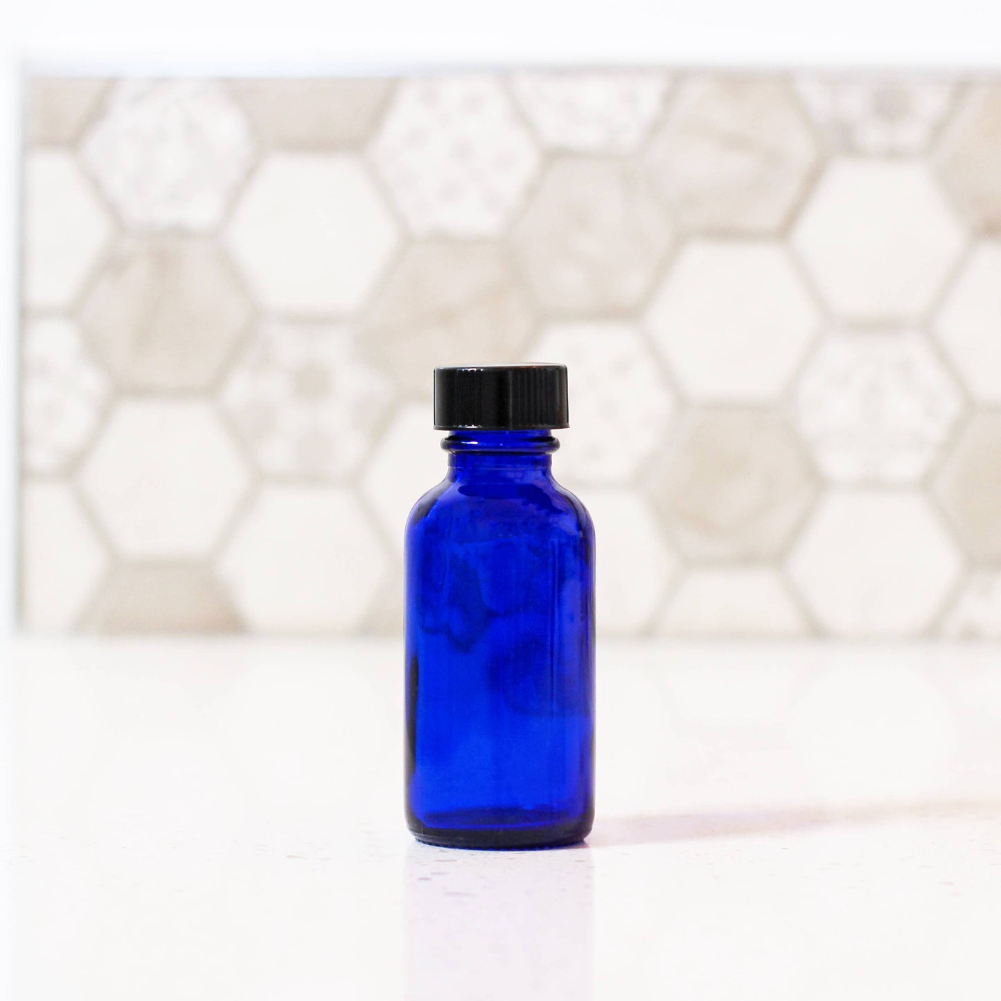 1oz Blue Glass Bottle With Cap