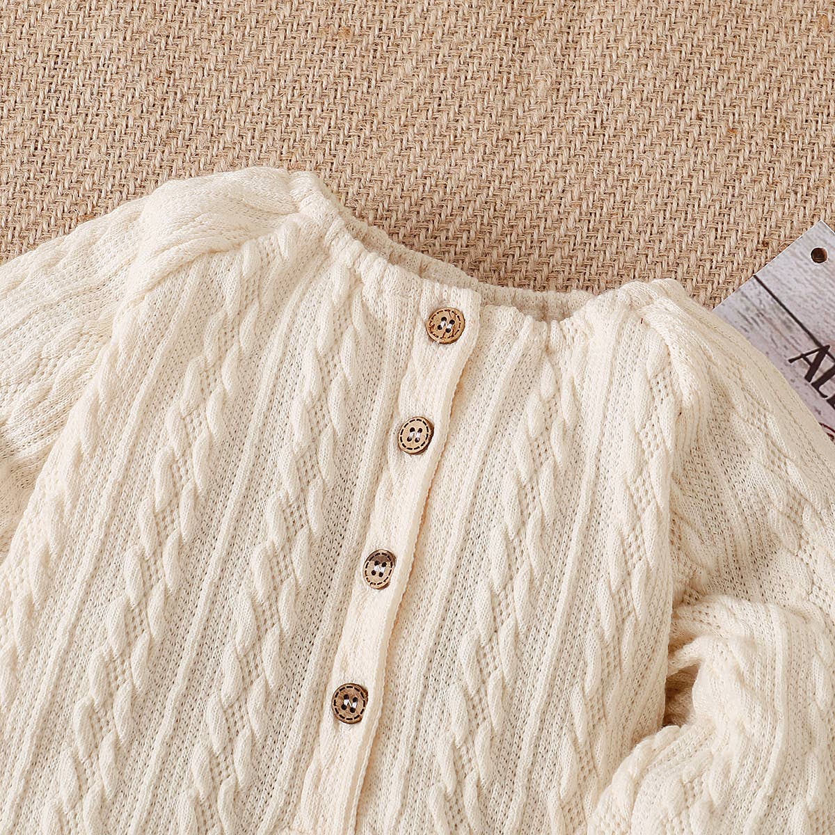 Solid Knitted Button Design Long-sleeve Baby Jumpsuit: 3-6 Months / White