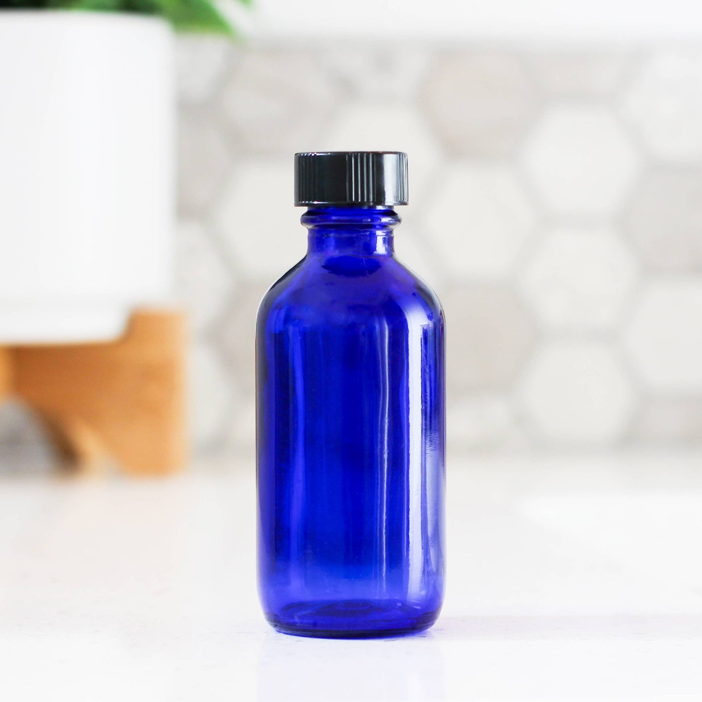 2oz Blue Glass Bottle With Cap