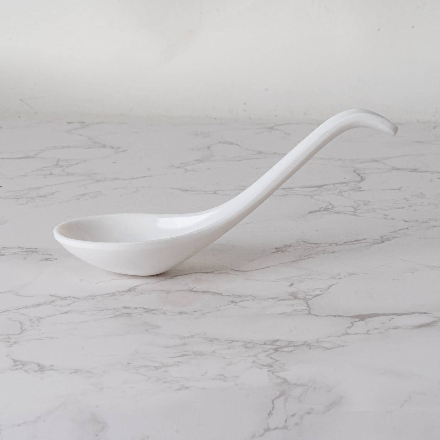 White Melamine 6 Inch Length Curved Soup Spoon (12/576)