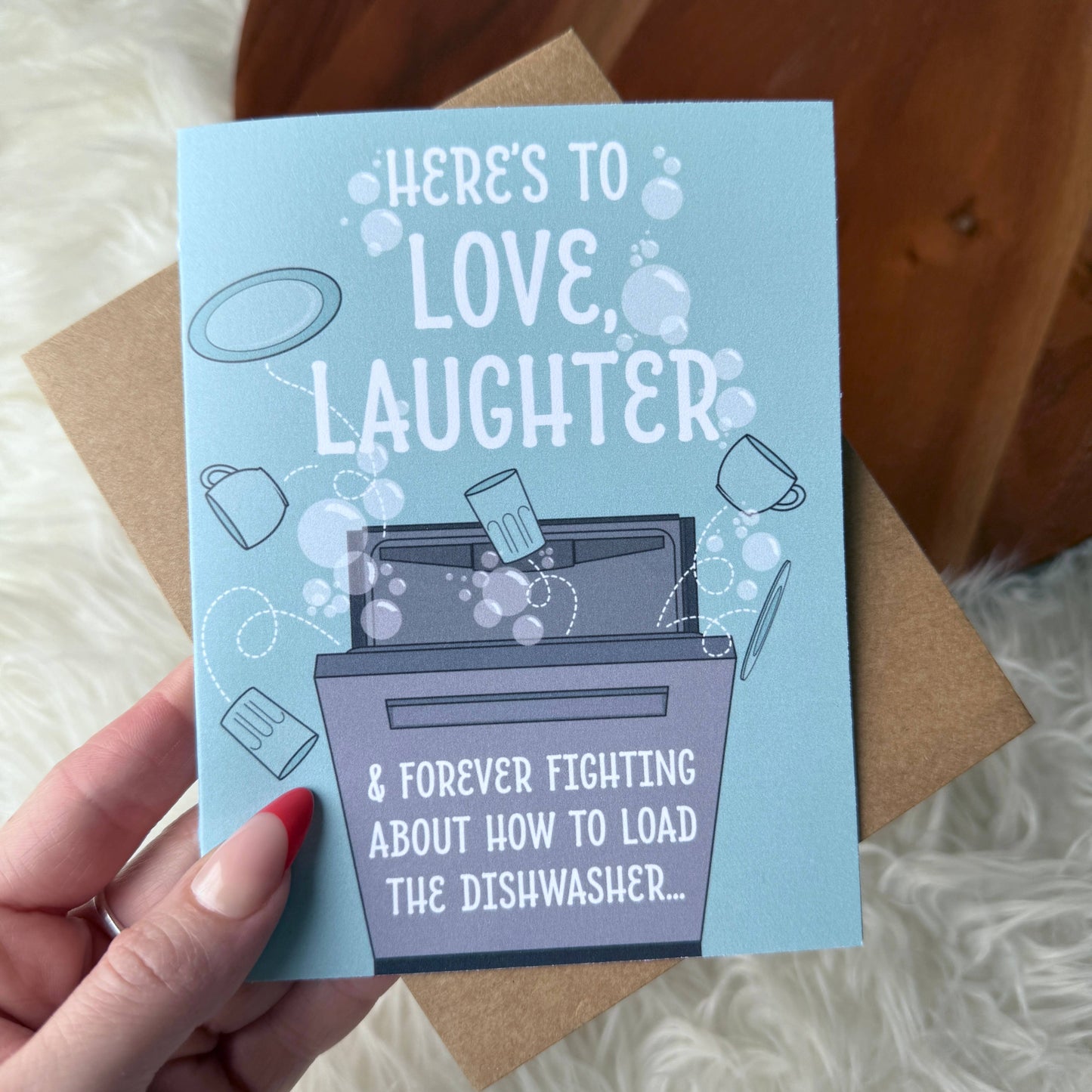 "Here's to love, laughter..." Funny Relatable Wedding Card