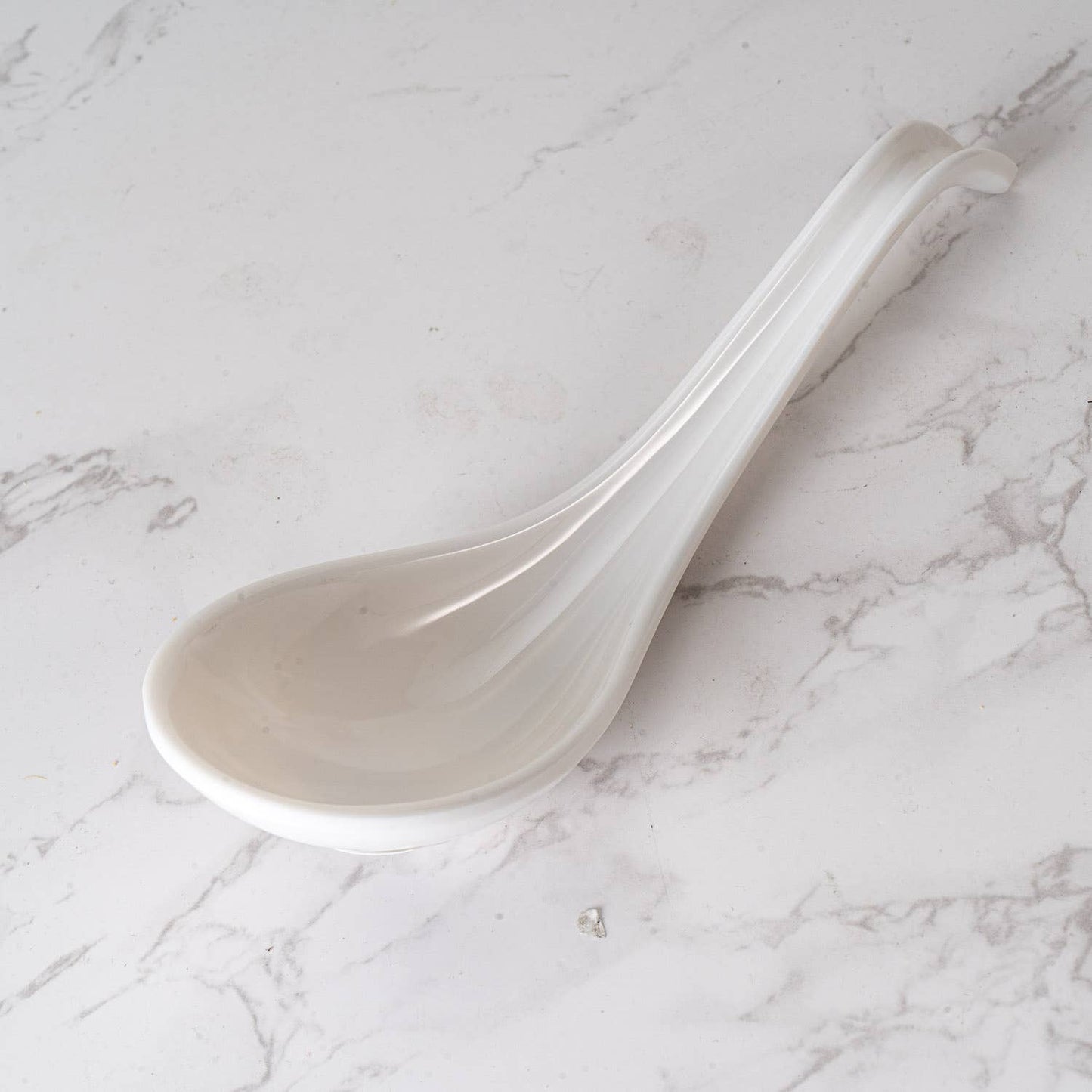 White Melamine 6 Inch Length Curved Soup Spoon (12/576)
