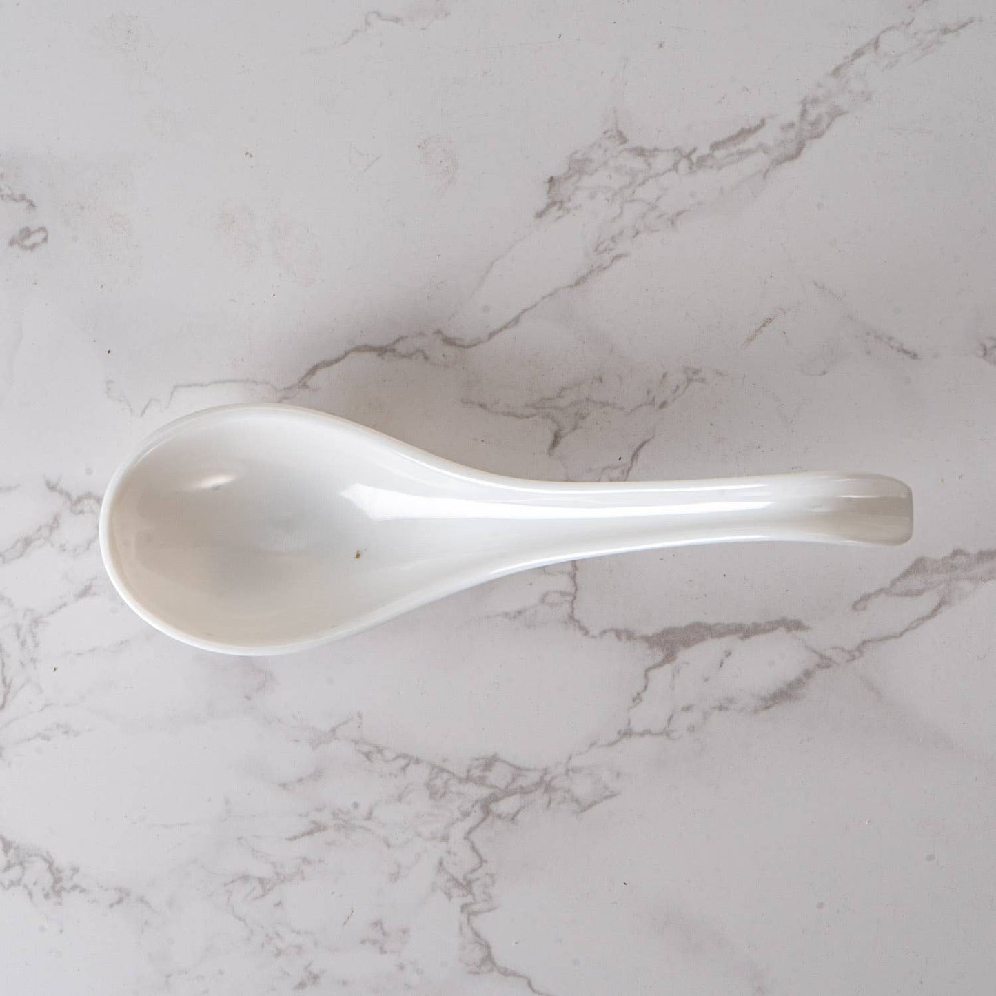 White Melamine 6 Inch Length Curved Soup Spoon (12/576)